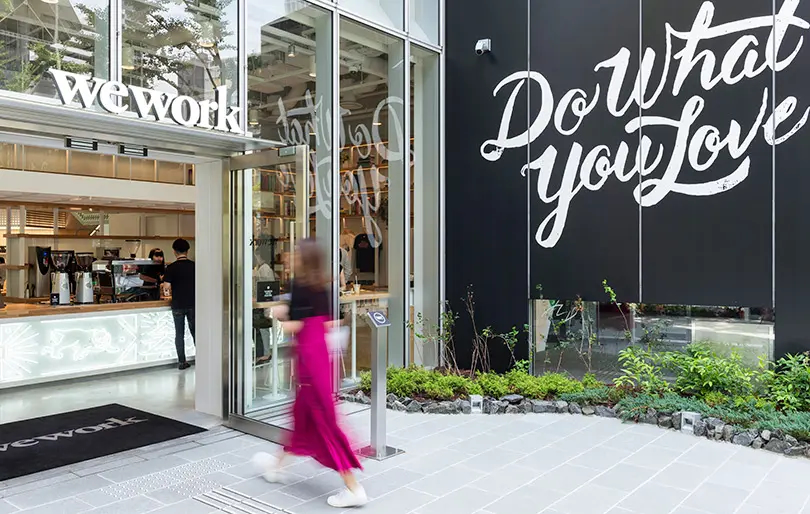 Person walking inside WeWork office